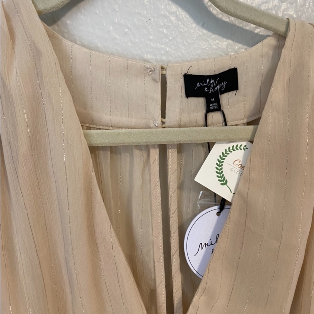 Tan&gold cocktail dress with an asymmetrical hem